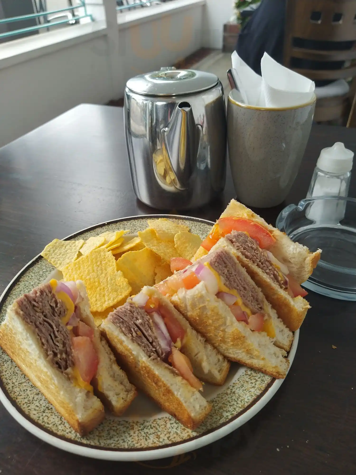Freshly made sandwich with crisps in the upstairs seating area
